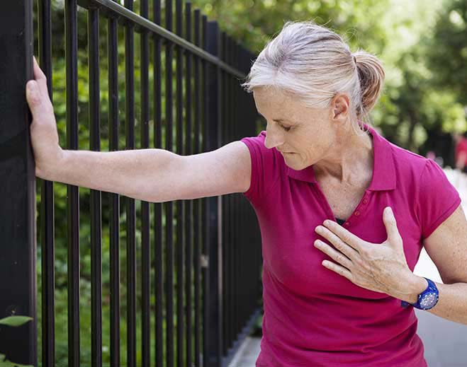 lady holding her chest